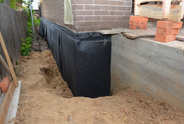 Happy homeowners after waterproofing job in Nelsonville